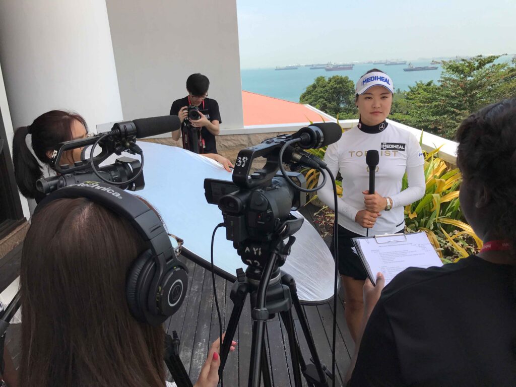 Nanyang Polytechnic Mass Media students filming an athlete interview during the FOX Sports Academy programme